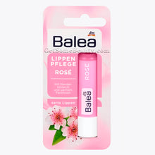 Intensive Lip Care with Roses Taste مرطب شفاه بزيت الورد بالي, حمل الصورة الى البوم الصور
